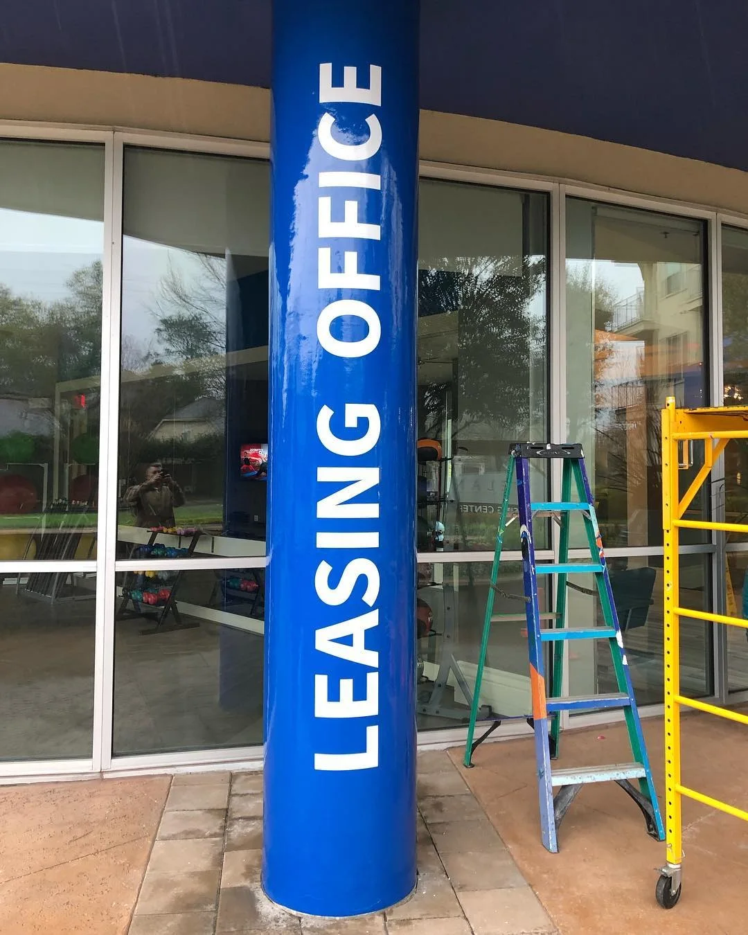 Leasing Office Architectural Column Wrap — Commercial Signage installed by Stingray Signs LLC