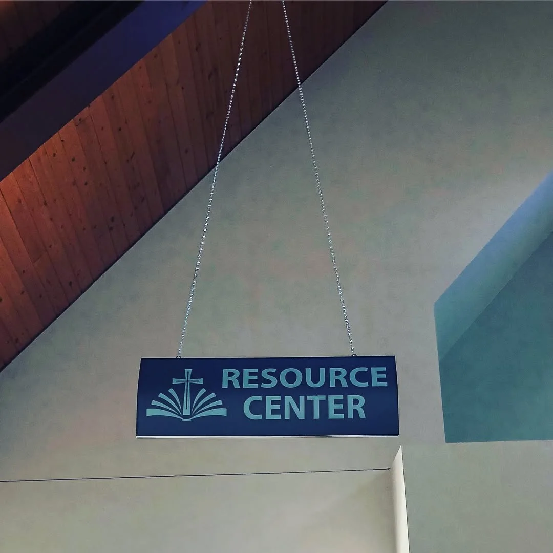 Resource Center Suspended Wayfinding Sign — Commercial Signage installed by Stingray Signs LLC