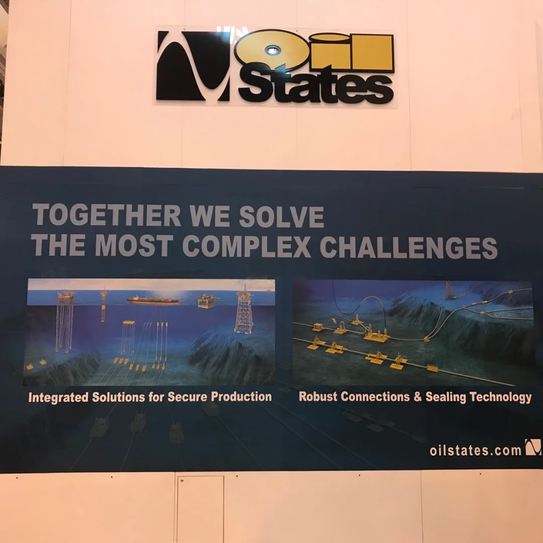 Oil States International corporate lobby dimensional standoff logo and engineering wall mural