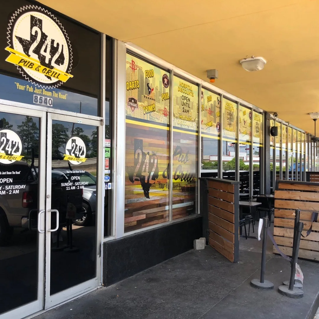 Storefront Window Graphics — Commercial installation by 3M Certified Stingray Signs LLC (Lululemon • Tom Ford • 242 Pub & Grill • Capgemini)